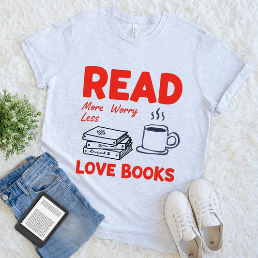 T-shirt with books, coffee mug, and calming bookish message