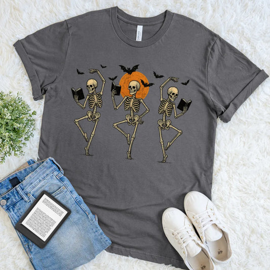 funny skeletons reading books t-shirt with Halloween moon