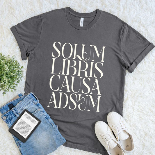 Vintage inspired bookish T-shirt featuring Solum Libris Causa Adsum in elegant serif typography on charcoal grey cotton