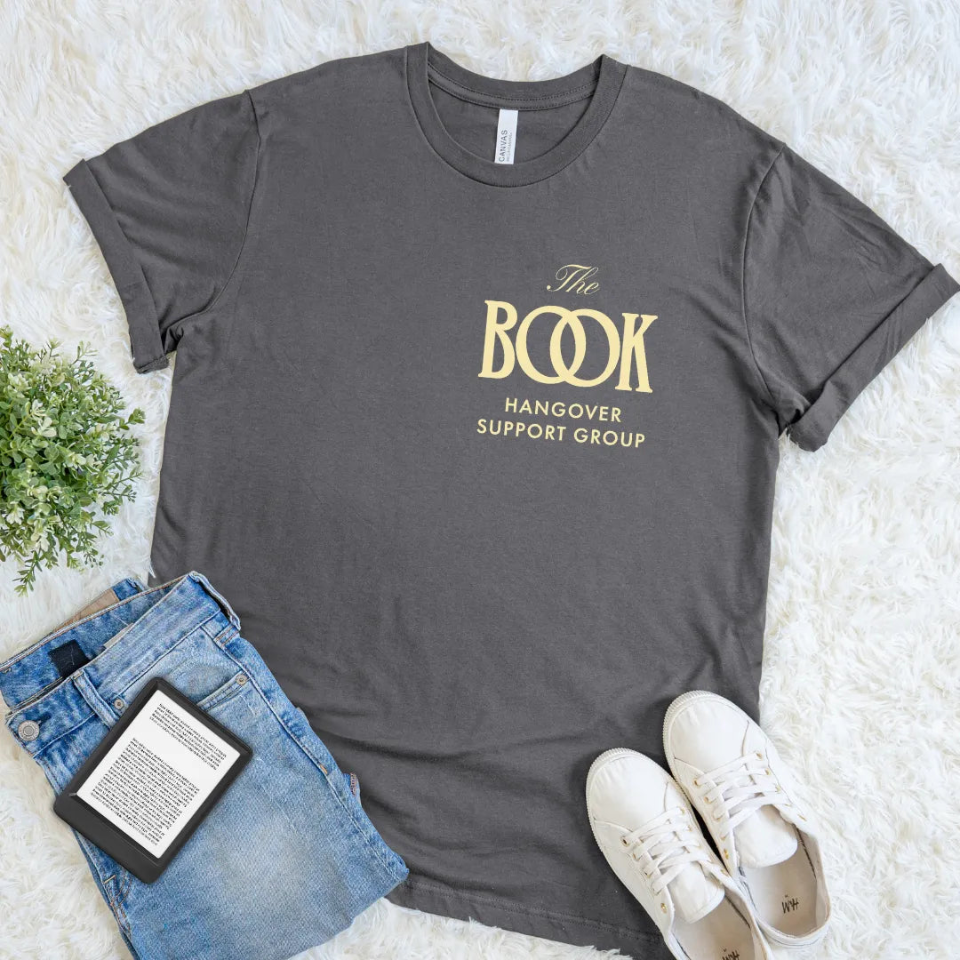 Cozy introvert shirt for post-read recovery and bookish comfort with golden logo “Book Hangover Support Group”