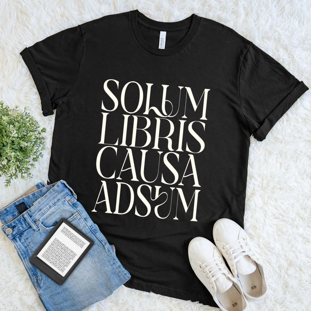 Minimalist literary shirt with Solum Libris Causa Adsum design for readers and dark academia book lovers on black cotton