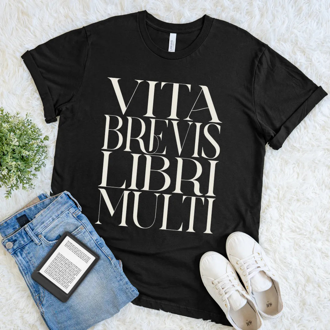Black vintage-inspired bookish tee with Vita Brevis Libri Multi typography for readers and bibliophiles.
