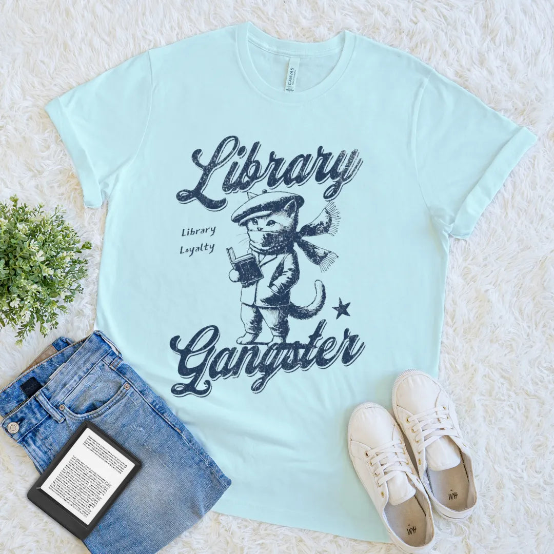 Funny bookish tee with reading cat and “Library Loyalty” design, book nerd gift