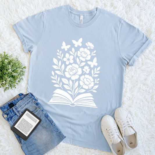 Graphic tee with botanical illustration and butterflies in light blue