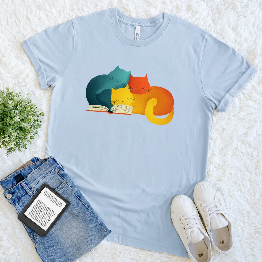 Cute feline reader t-shirt with vibrant print in light blue