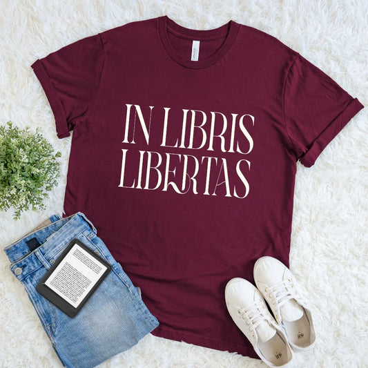 Maroon soft cotton T-shirt with elegant dark academia motto “In Libris Libertas” in white