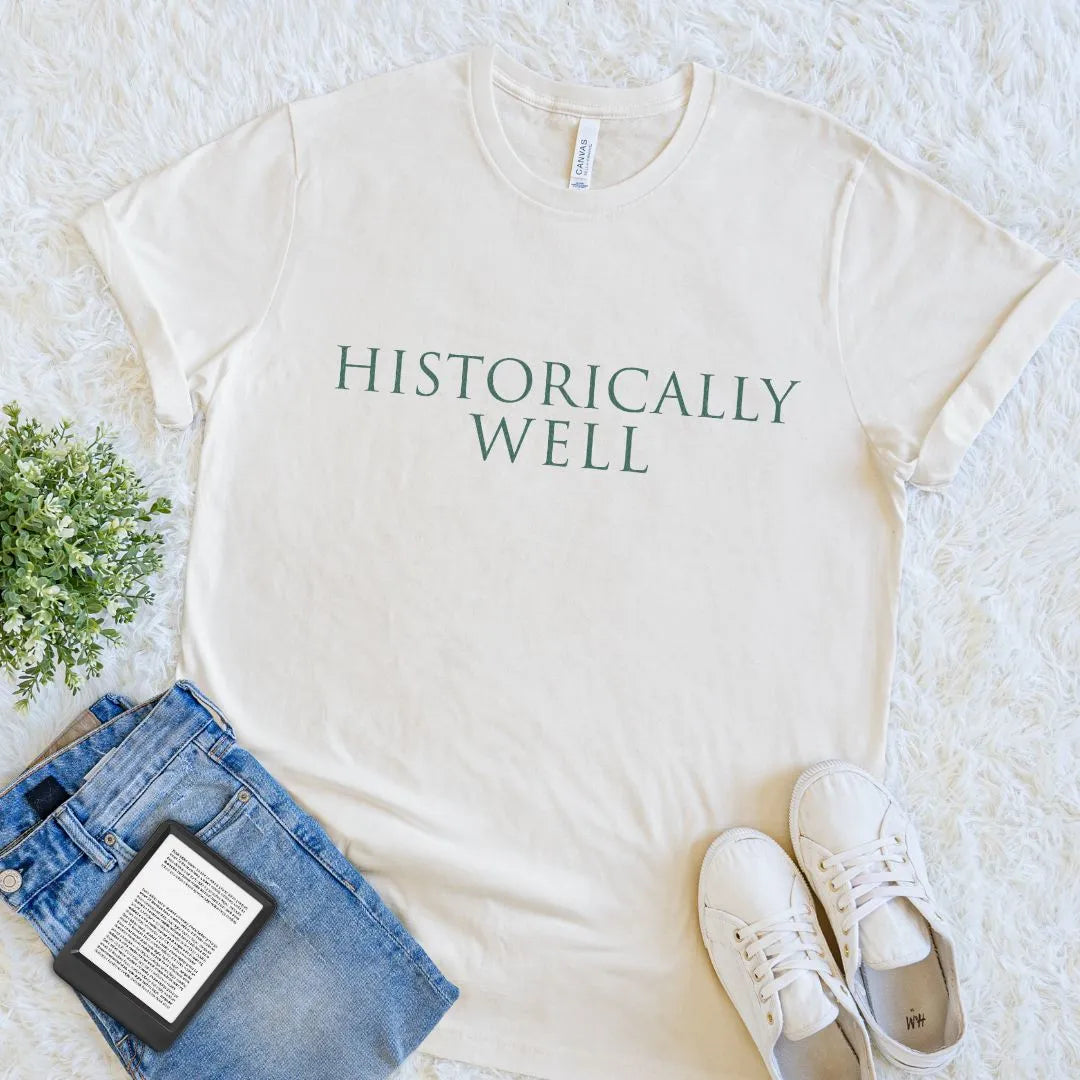 Cream book lover T-shirt with minimalist history inspired slogan "Historically well"