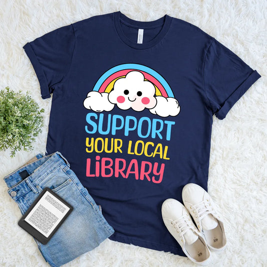 Navy shirt with smiling cloud and rainbow design with library message