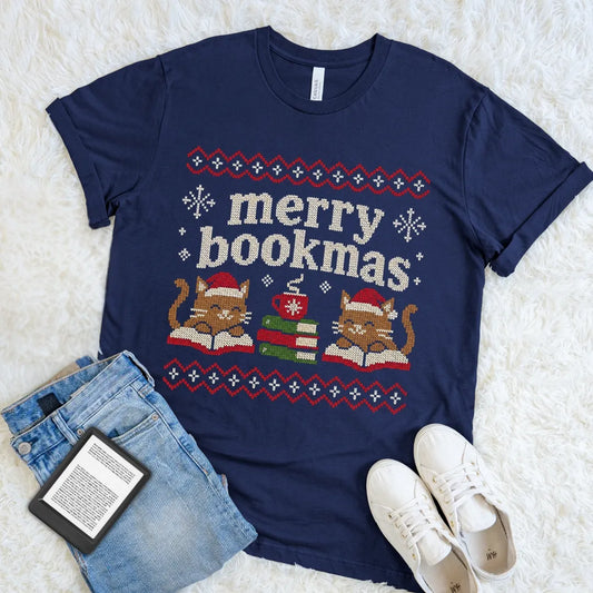 Navy Merry Bookmas T-shirt with two reading cats in Santa hats and retro holiday patterns