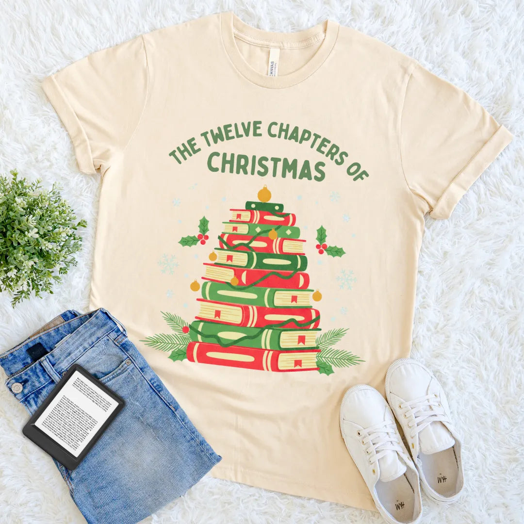 Cream tee featuring “The Twelve Chapters of Christmas” and holiday books