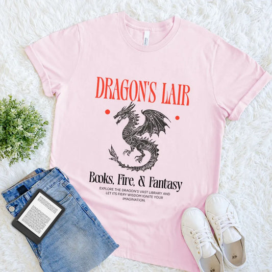 Soft pink cotton graphic fantasy tee with dragon and book library theme