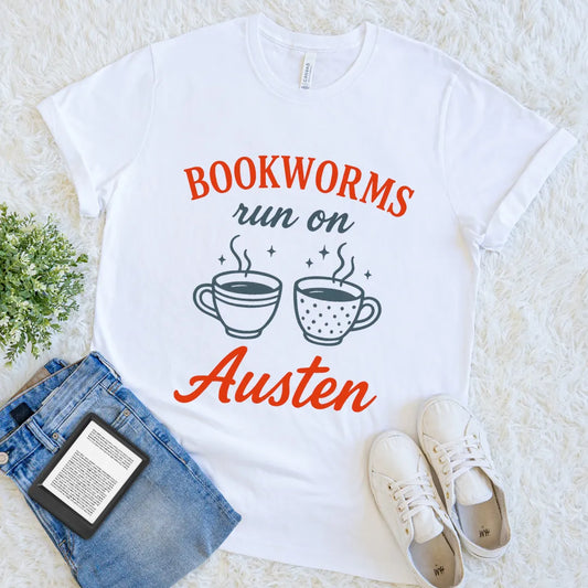 White tee with two steaming mugs and “Bookworms Run on Austen” text