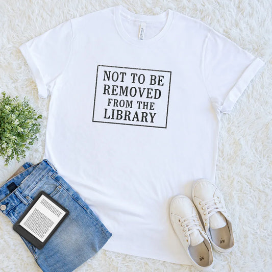 White soft cotton t-shirt with 'Not to be removed from the library' stamp, paired with demin