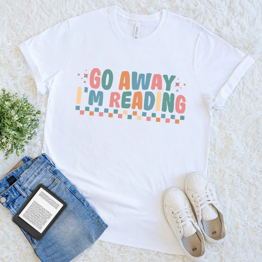 White t-shirt with 'Go Away I'm Reading' text, funny introvert reading tee