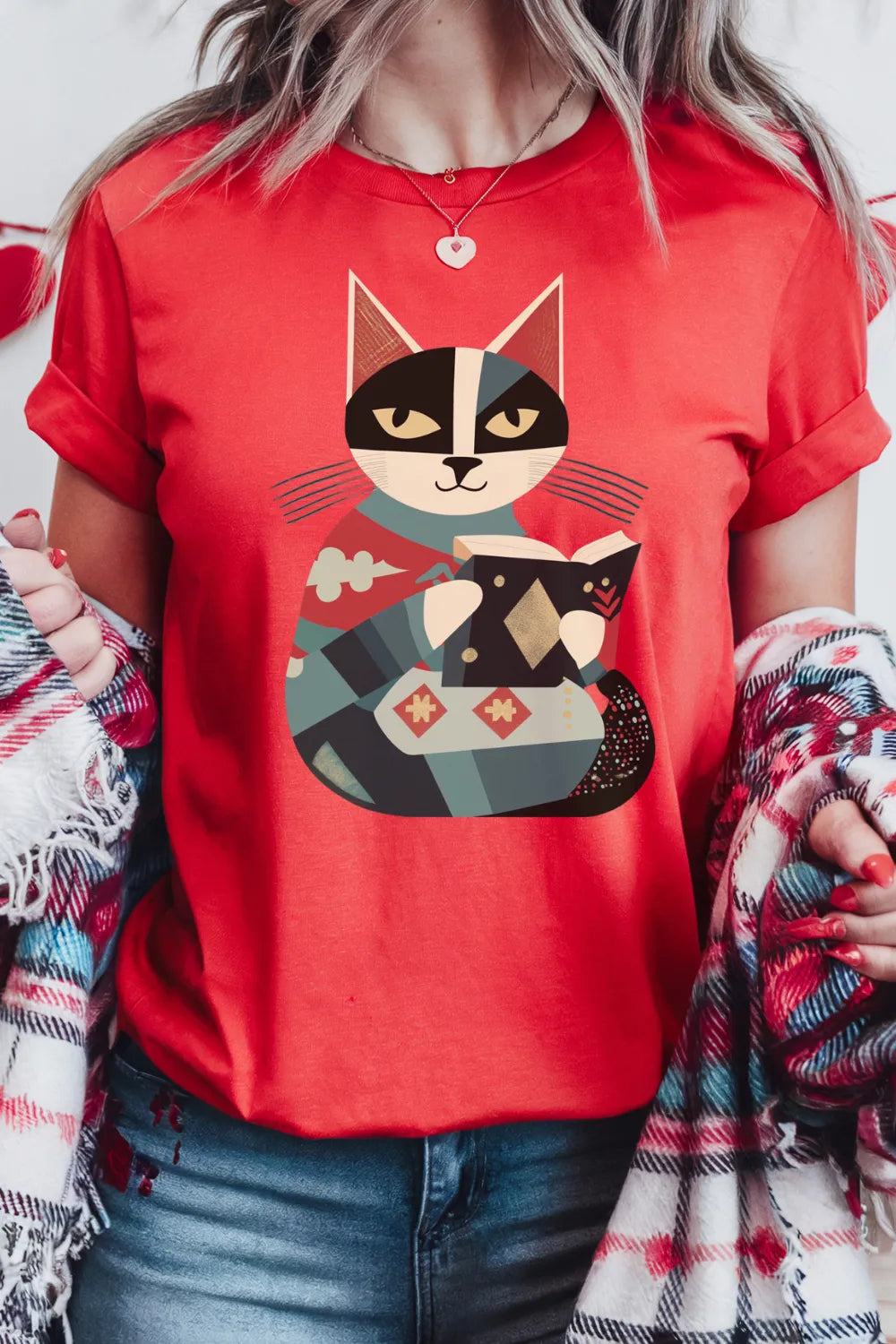 woman wearing red book lover vintage t-shirt with whimsical feline print