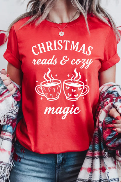 Woman wearing soft cotton red t-shirt outfit with festive mugs and cozy holiday text “Christmas reads & cozy magic”