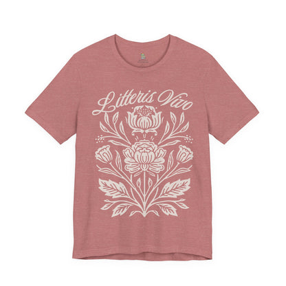 Heather mauve Litteris Vivo literary shirt shown from the front with delicate ivory wildflowers and flowing script