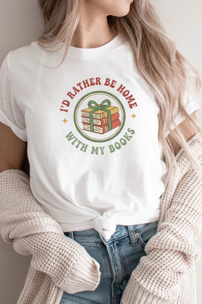 woman wearing gift-worthy T-shirt for quiet festive readers with stack of books and ribbon