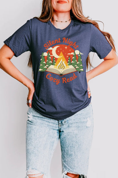 woman wearing festive introvert reader t shirt with forest design and open book