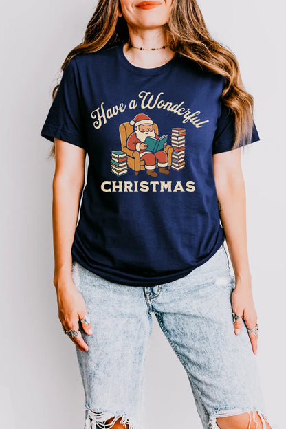woman wearing navy T-shirt outfit with Santa reading in armchair and “Have a Wonderful Christmas” text