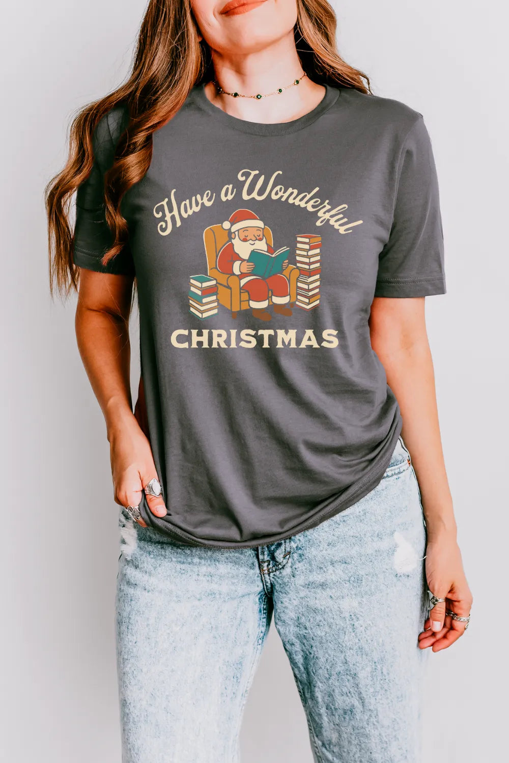 woman wearing gray vintage-style Christmas t shirt for book lovers with “Have a Wonderful Christmas” text
