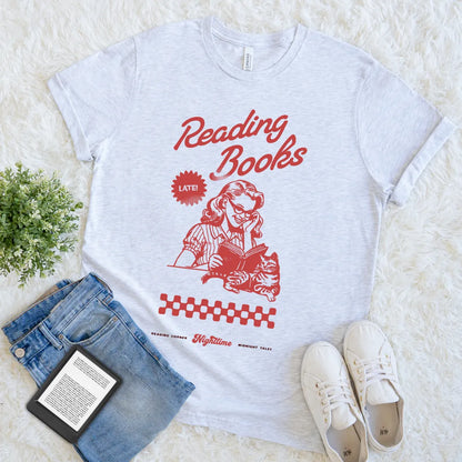 flat lay of ash grey retro reading t-shirt with reading girl and cat design 