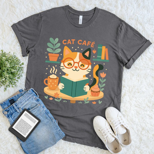 grey shirt with cute cat reading a book with coffee and muffin nearby