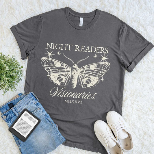 Dark aesthetic reader shirt with detailed moth graphic and celestial stars on navy fabric