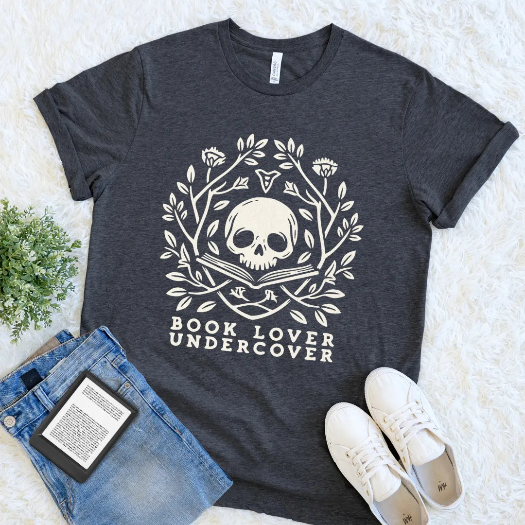 Dark Grey Heather dark academia tee featuring a literary skull framed by winding branches, leaves, and wildflowers