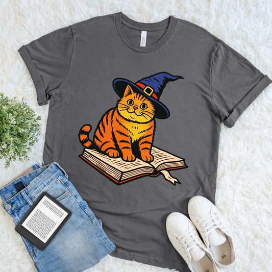 Charcoal reader shirt with adorable orange cat wearing a witch hat on an open book
