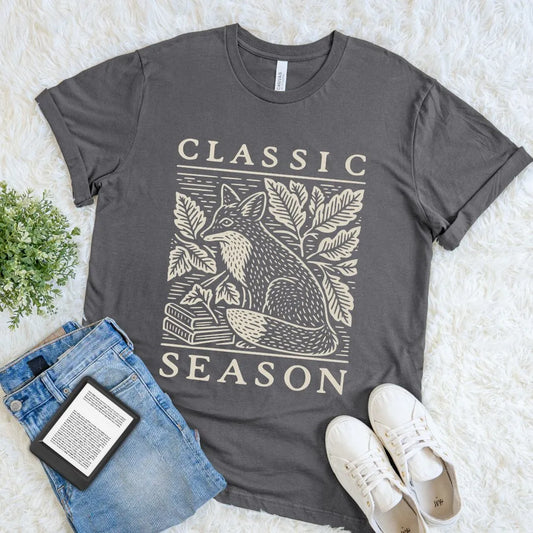 Asphalt reader shirt combining a vintage woodcut fox and stacked books with the phrase Classic Season