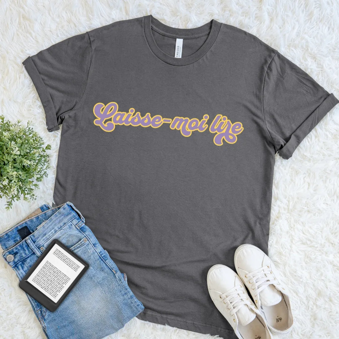 Asphalt Laisse-Moi Lire French reader T-shirt with colorful groovy retro typography, a playful bookish graphic tee for devoted readers and Francophiles.