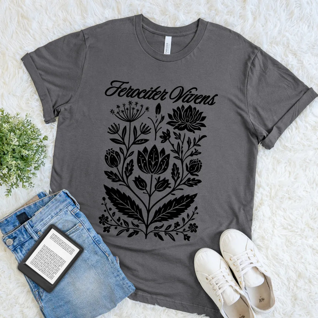 Asphalt Ferociter Vivens botanical T-shirt featuring pale vintage floral artwork and Latin typography, a dark academia statement tee for quietly formidable minds.
