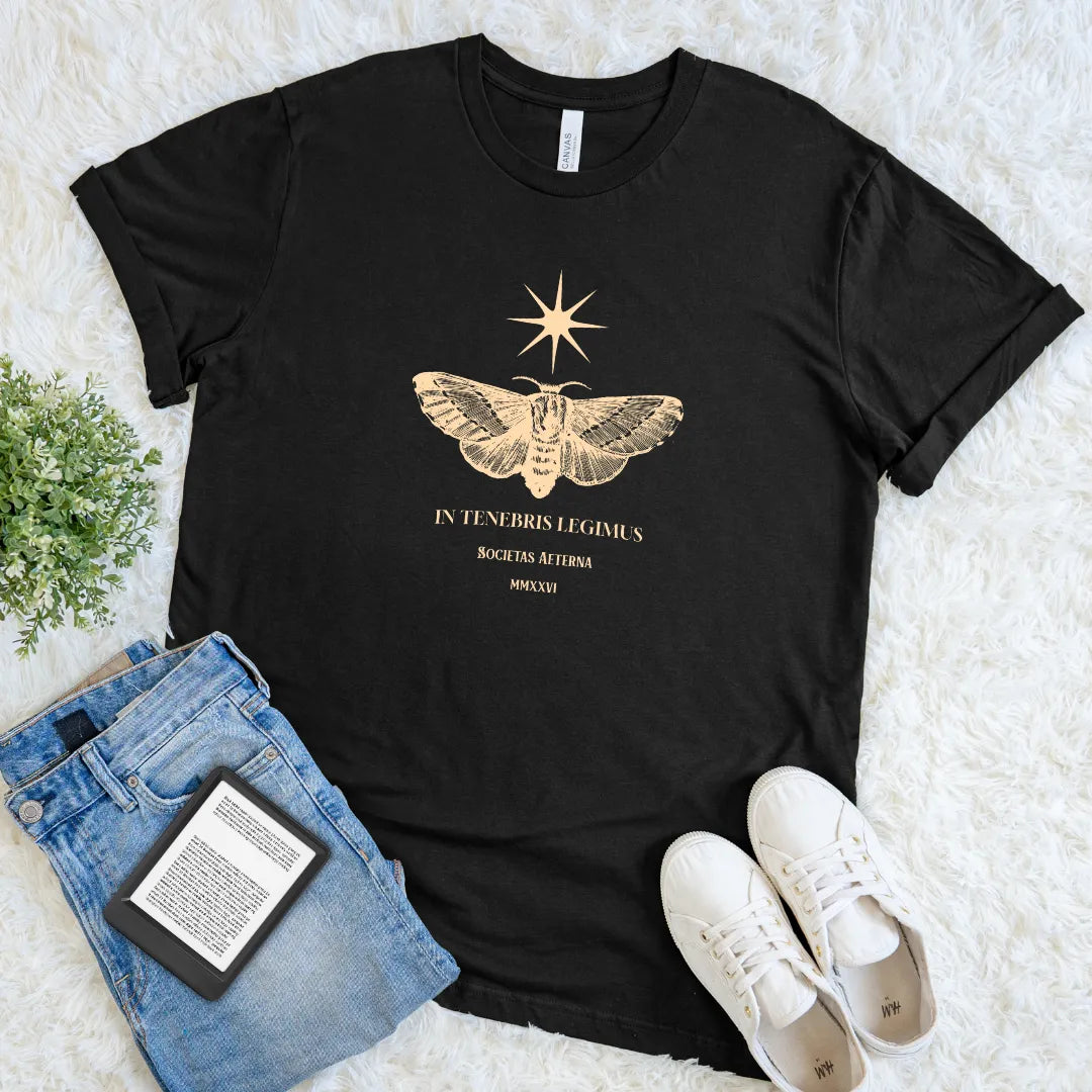 Soft black cotton t-shirt featuring latin quote and vintage moth and stars design 