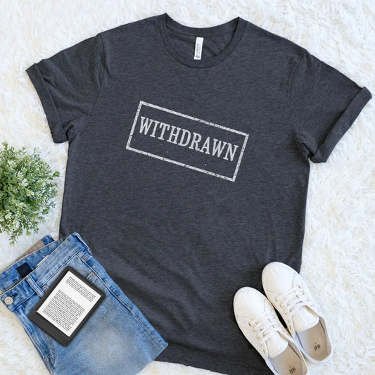 Flat lay of soft cotton introvert shirt with vintage library-style typography in dark grey heather 