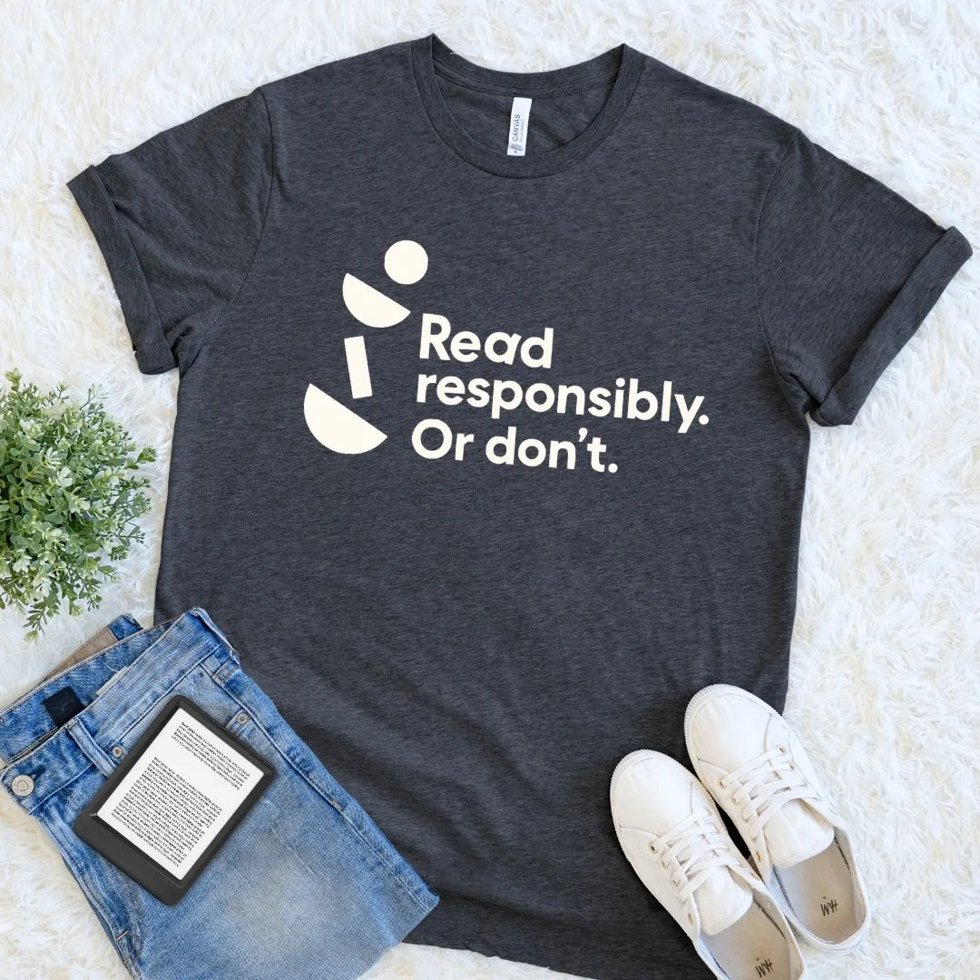 Dark Grey Heather Read Responsibly Or Don’t bookish graphic tee with modern typography and quirky geometric details, an understated literary humor shirt.