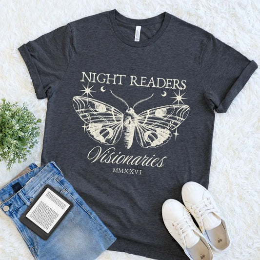Cozy book lover T-shirt in dark grey heather featuring night readers text and moth artwork  