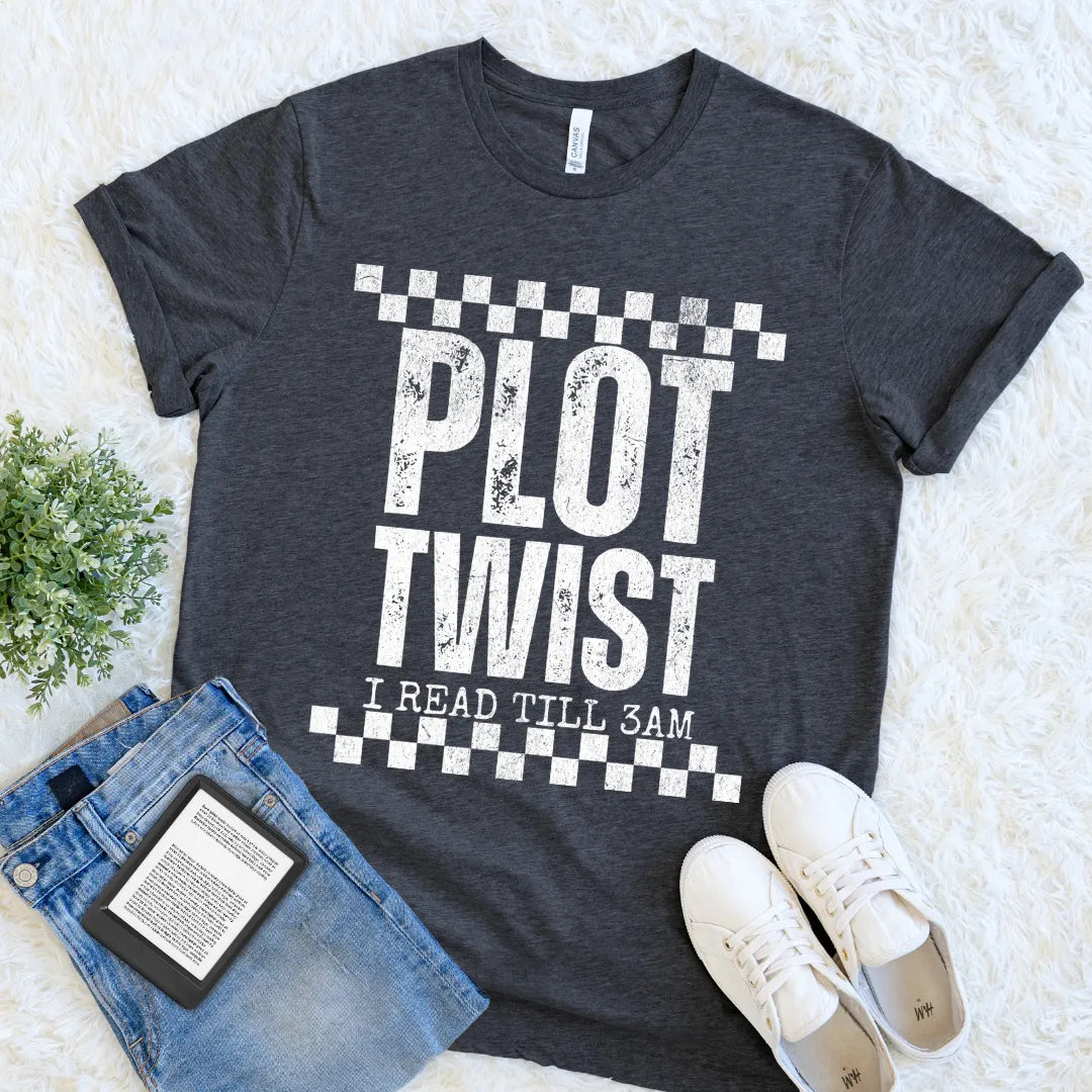book lover dark gray heather t-shirt with 'Plot Twist I Read Till 3AM' text, paired with jeans and sneakers on a light background.