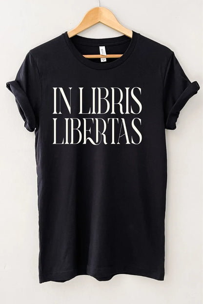 Black dark academia aesthetic graphic t-shirt featuring elegant “In Libris Libertas” Latin typography for book lovers
