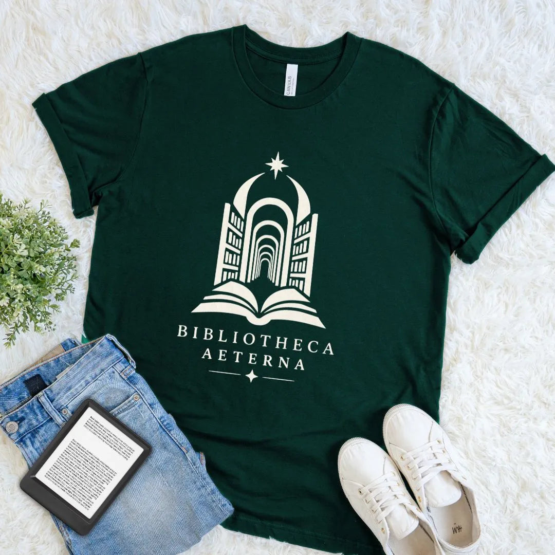 Forest green dark academia tee depicting a mysterious library passage rising from a book