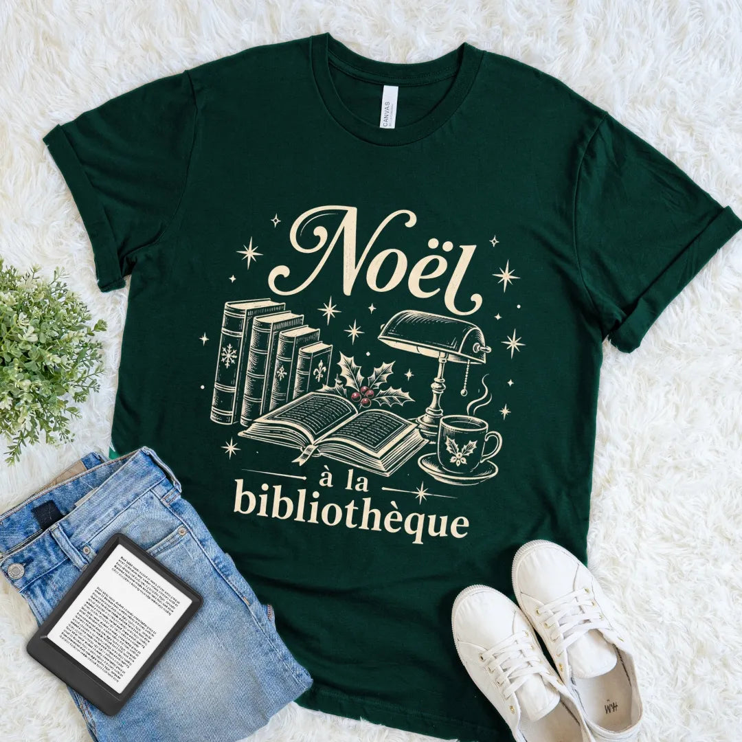 Forest green French Christmas library tee featuring a cozy vintage reading scene in soft cream
