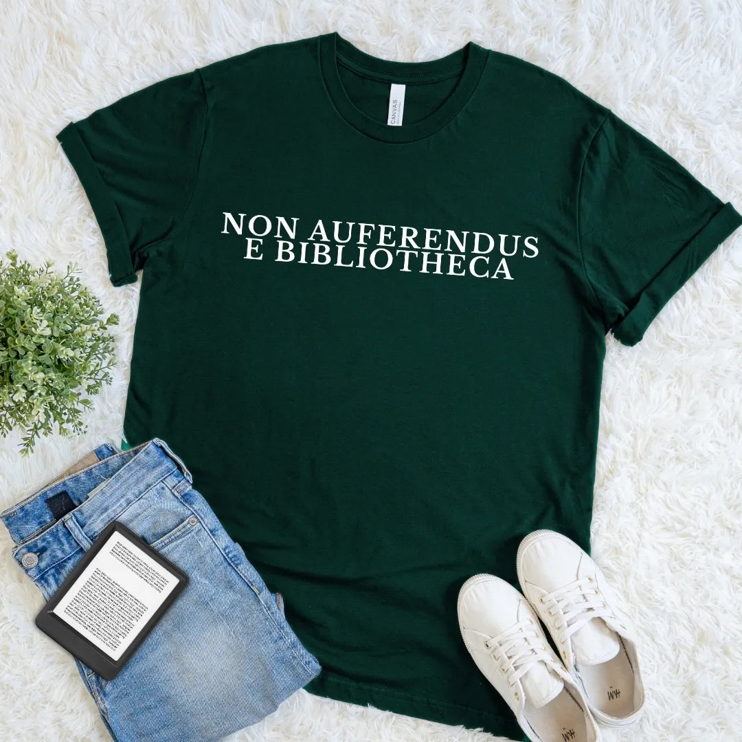 Forest green Non Auferendus E Bibliotheca library T-shirt with cream Latin quote typography meaning “do not remove from the library,” a dark academia book lover shirt for readers, librarians, bibliophiles, and literary humor fans.