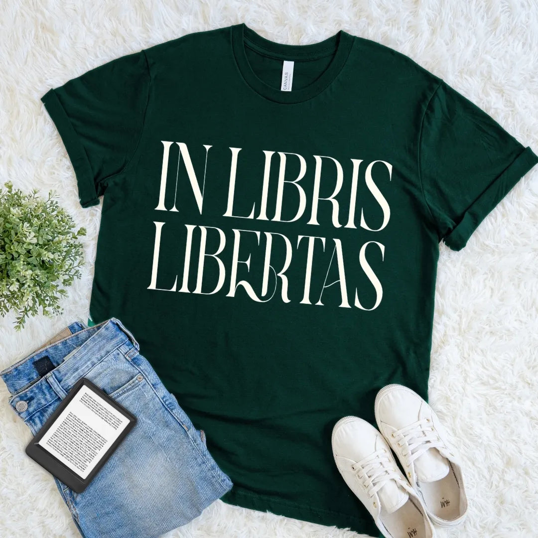 Forest green book lover T-shirt featuring “In Libris Libertas” Latin quote, dark academia reader shirt with vintage literary typography for library lovers.