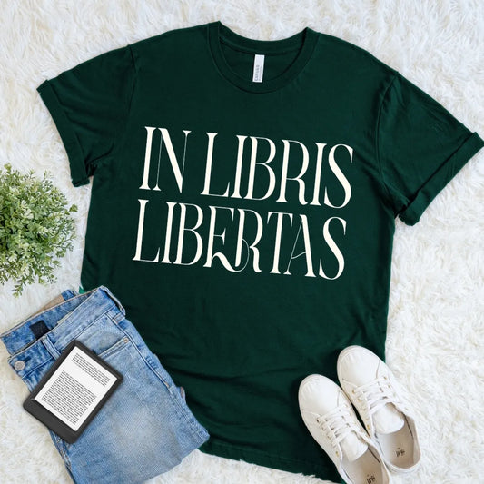 Forest green book lover T-shirt featuring “In Libris Libertas” Latin quote, dark academia reader shirt with vintage literary typography for library lovers.
