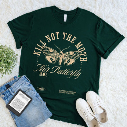 Dark academia reader tee featuring “Kill Not the Moth Nor Butterfly”  poetry quote in forest green 