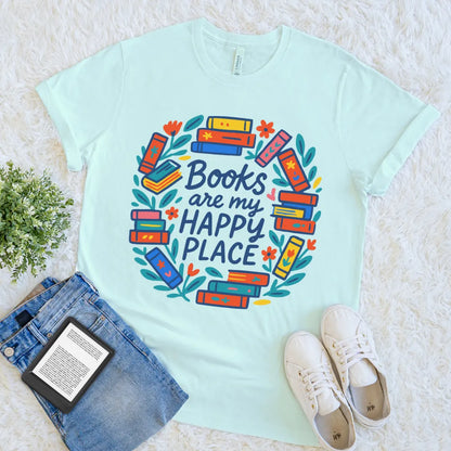 Heather Ice blue graphic reader tee featuring stacked books and leafy wreath
