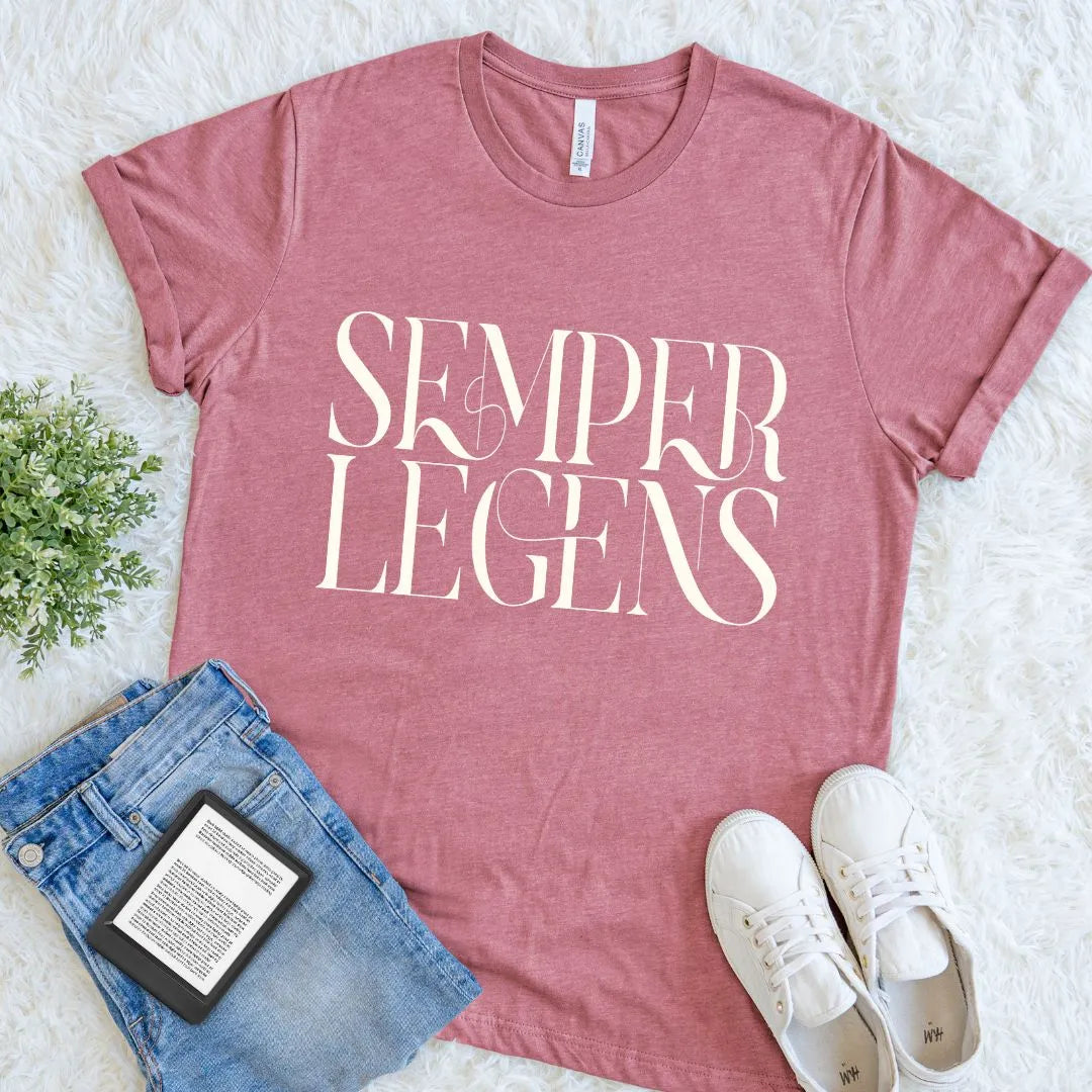 Vintage inspired bookish T-shirt with classic serif typography on muted pink  fabric