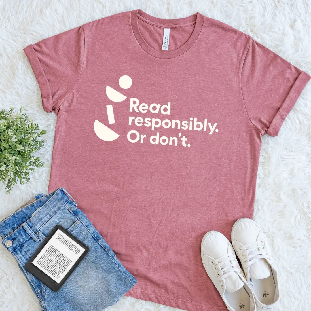 Heather Mauve Read Responsibly Or Don’t literary T-shirt with modern lettering and quirky geometric details, a playful bookish shirt for devoted readers.
