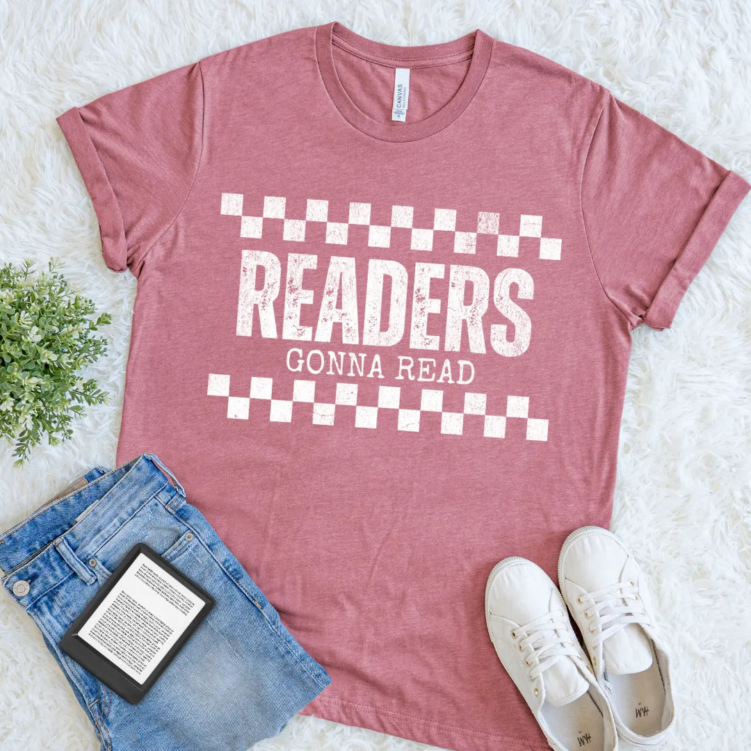 Book lover shirt in heather mauve featuring a "readers gonna read" text and checkered design, styled with jeans for cozy bookish outfit