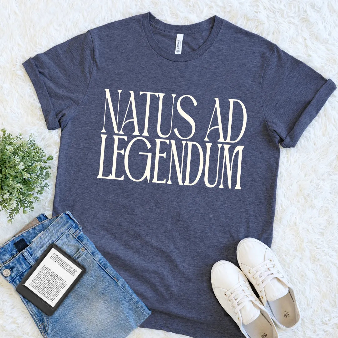 Latin reader shirt with bold Natus ad Legendum typography meaning born to read on heather navy fabric